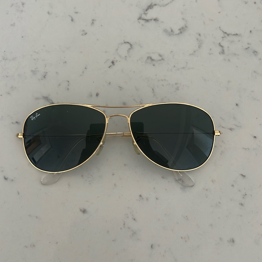 Gold and green Rayban aviators